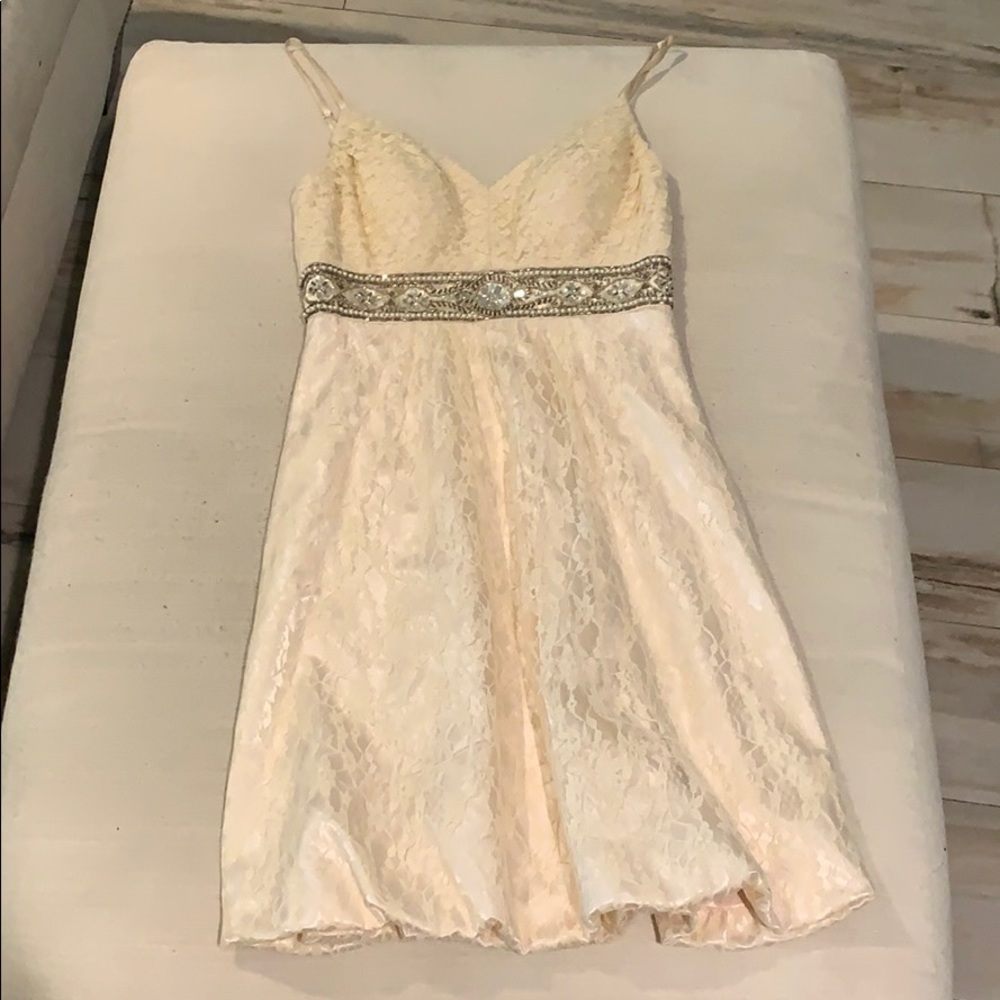 Rosy cream colored dress